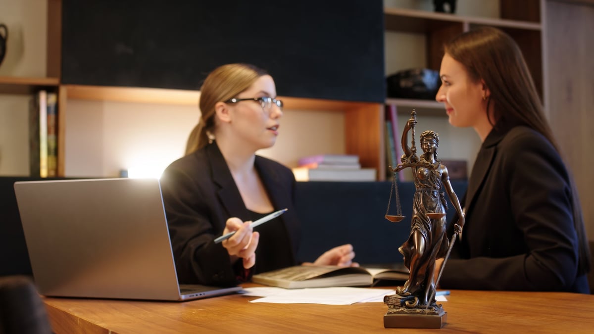 Free Legal Aid Youth Court solicitor consulting with a young person about their legal rights and Youth Court proceedings