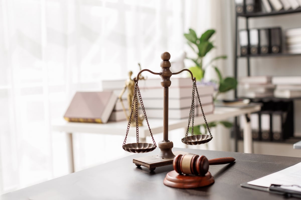 Free Legal Aid Crown Court solicitor gavel and justice statue representing criminal defence legal services at the Crown Court